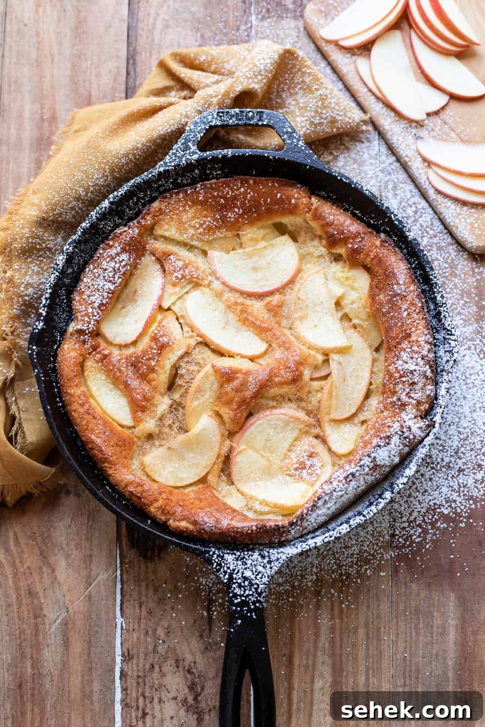 Great-Grandma's Cinnamon Apple Dutch Baby Recipe 2 Beautiful, puffy cinnamon apple dutch baby. Crispy buttery edges and dreamy honey crisp apples make this cinnamon apple dutch baby pure perfection. A dust of cinnamon sugar completes it.