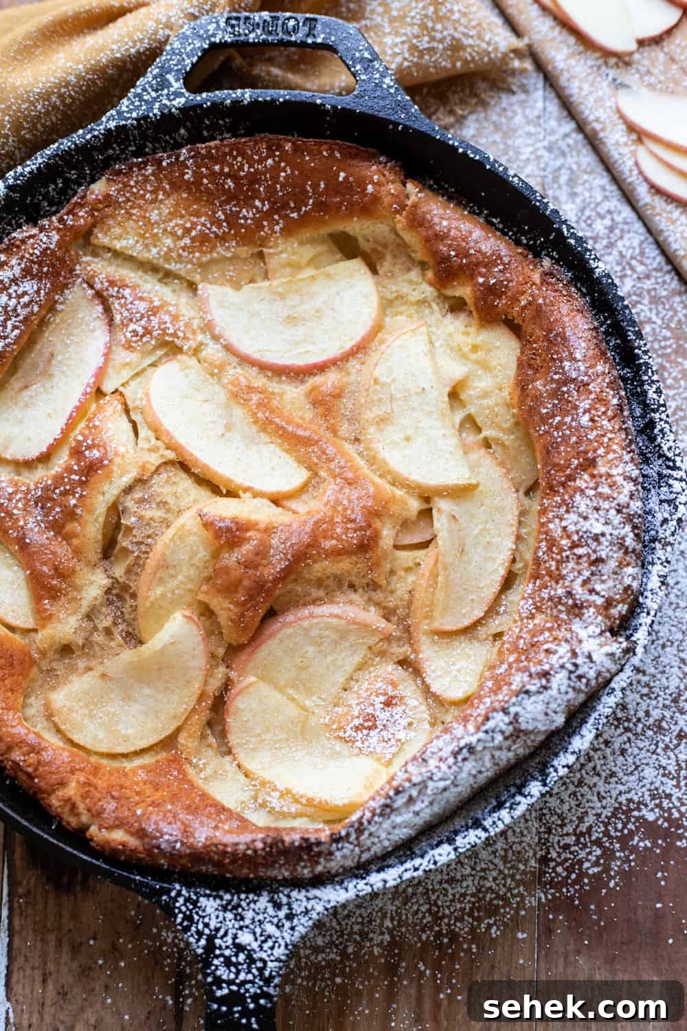 Great-Grandma's Cinnamon Apple Dutch Baby Recipe 4 Beautiful, puffy cinnamon apple dutch baby. Crispy buttery edges and dreamy honey crisp apples make this cinnamon apple dutch baby pure perfection. A dust of cinnamon sugar completes it.