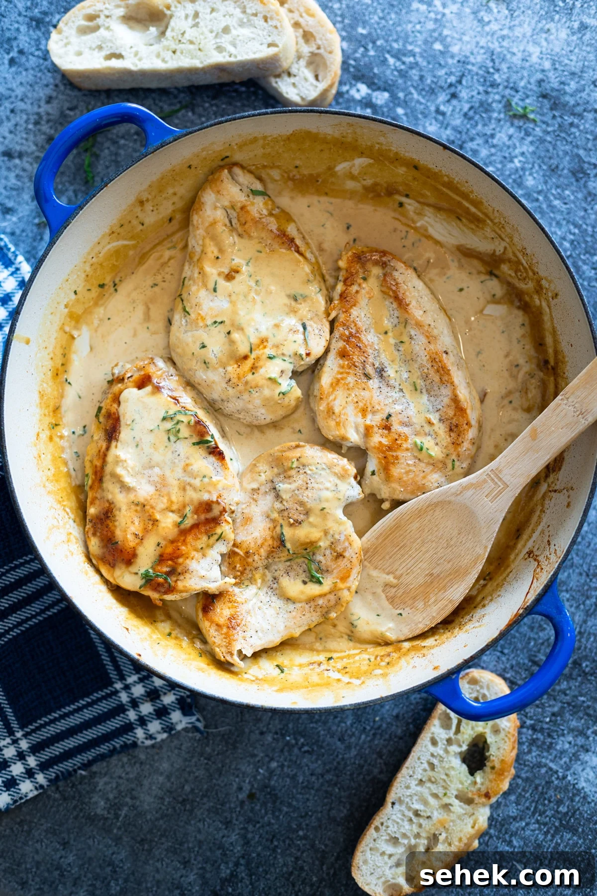 Skillet Chicken with Creamy Mustard Sauce 2 Skillet filled with chicken breasts cooked in cream sauce.