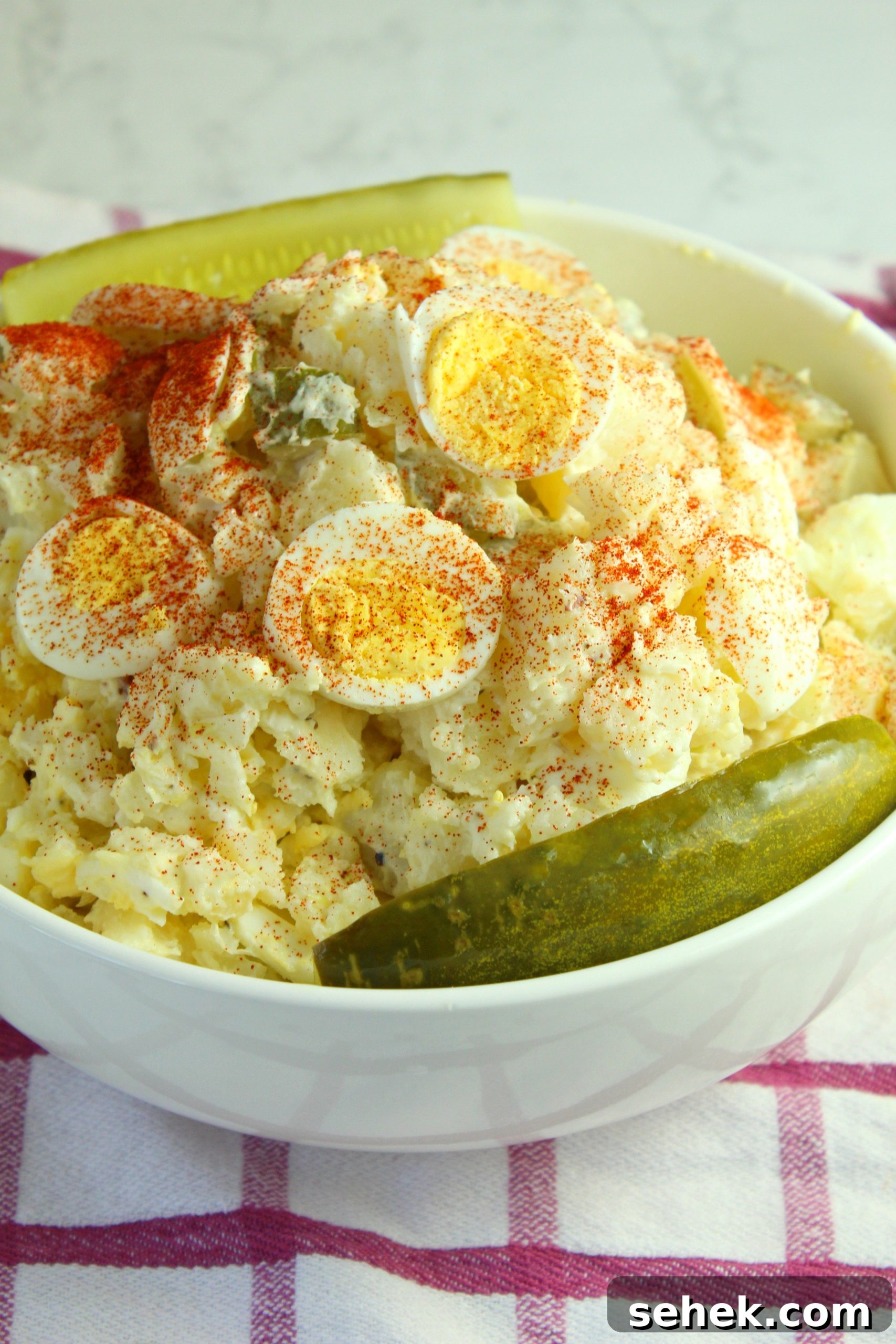 Tangy Dill Pickle Potato and Egg Salad 7 Dill pickle potato egg salad in bowl